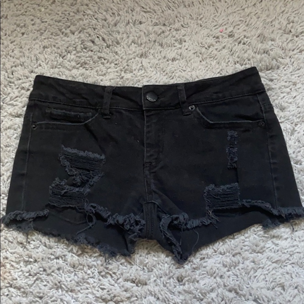 Black distressed shorts